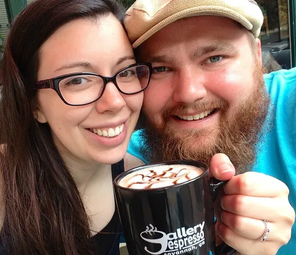 Will and his wife Nancy sitting at a coffee shop.